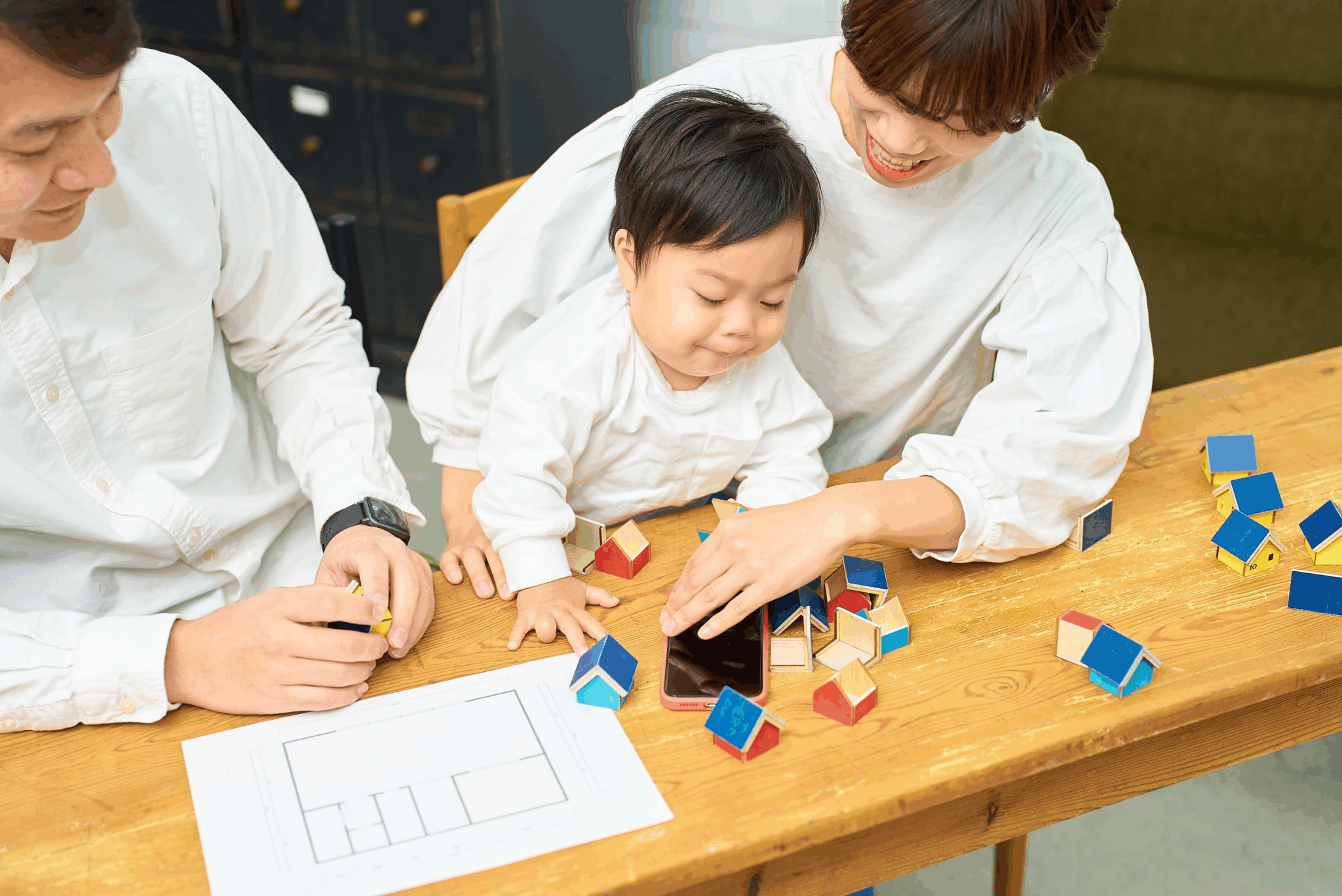 Parents And Child Playing