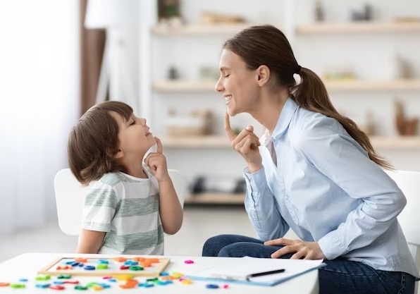 Speech Training Kids Professional Woman Training With Little Boy Cabinet Teaching Right 116547 18716